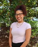 A young woman smiling